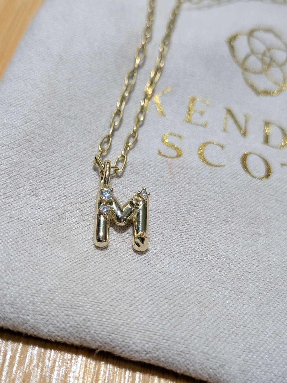 Kendra Scott: Letter M Gold Short Pendant Necklace in White Crystal